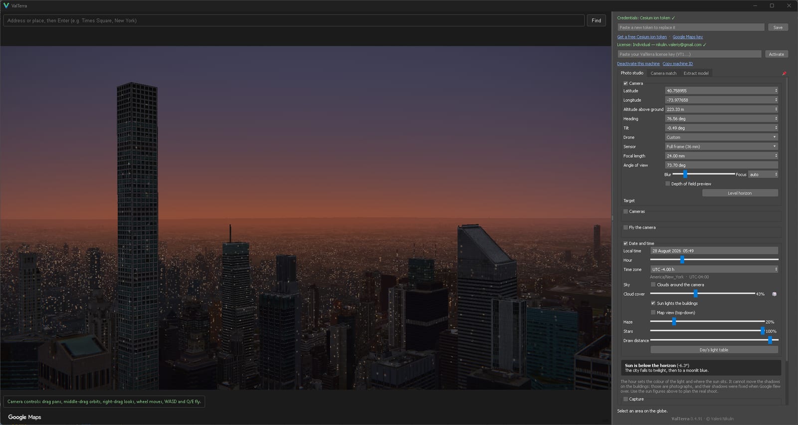The same view at 5:49, before sunrise: an orange band along the horizon and the city still lit by its own windows.