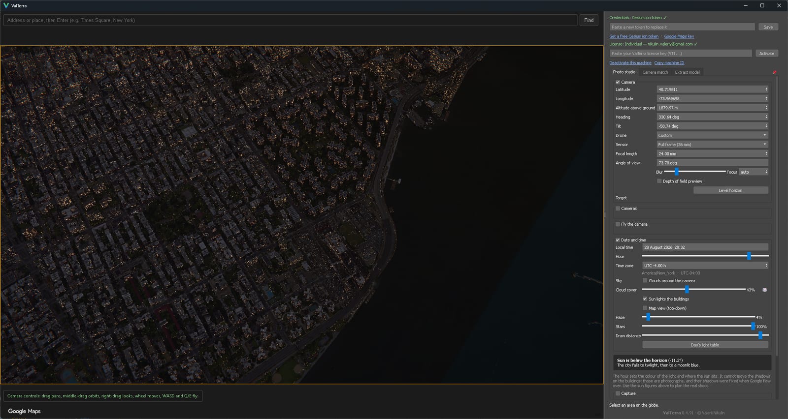 A night view from 1,879 metres above the Hudson shoreline, the street grid drawn by its own lighting.