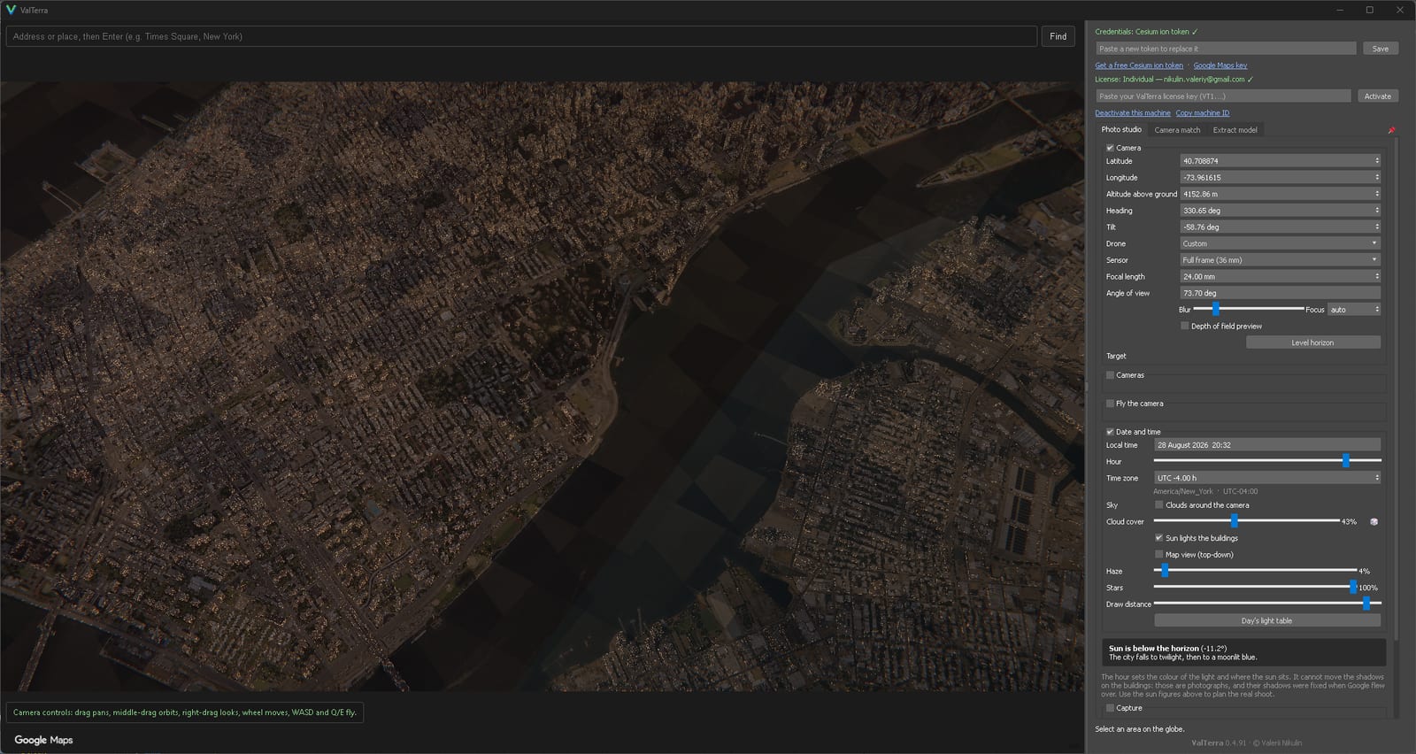 A night view from 4,152 metres: the river, the crossings and the whole street grid in one frame.